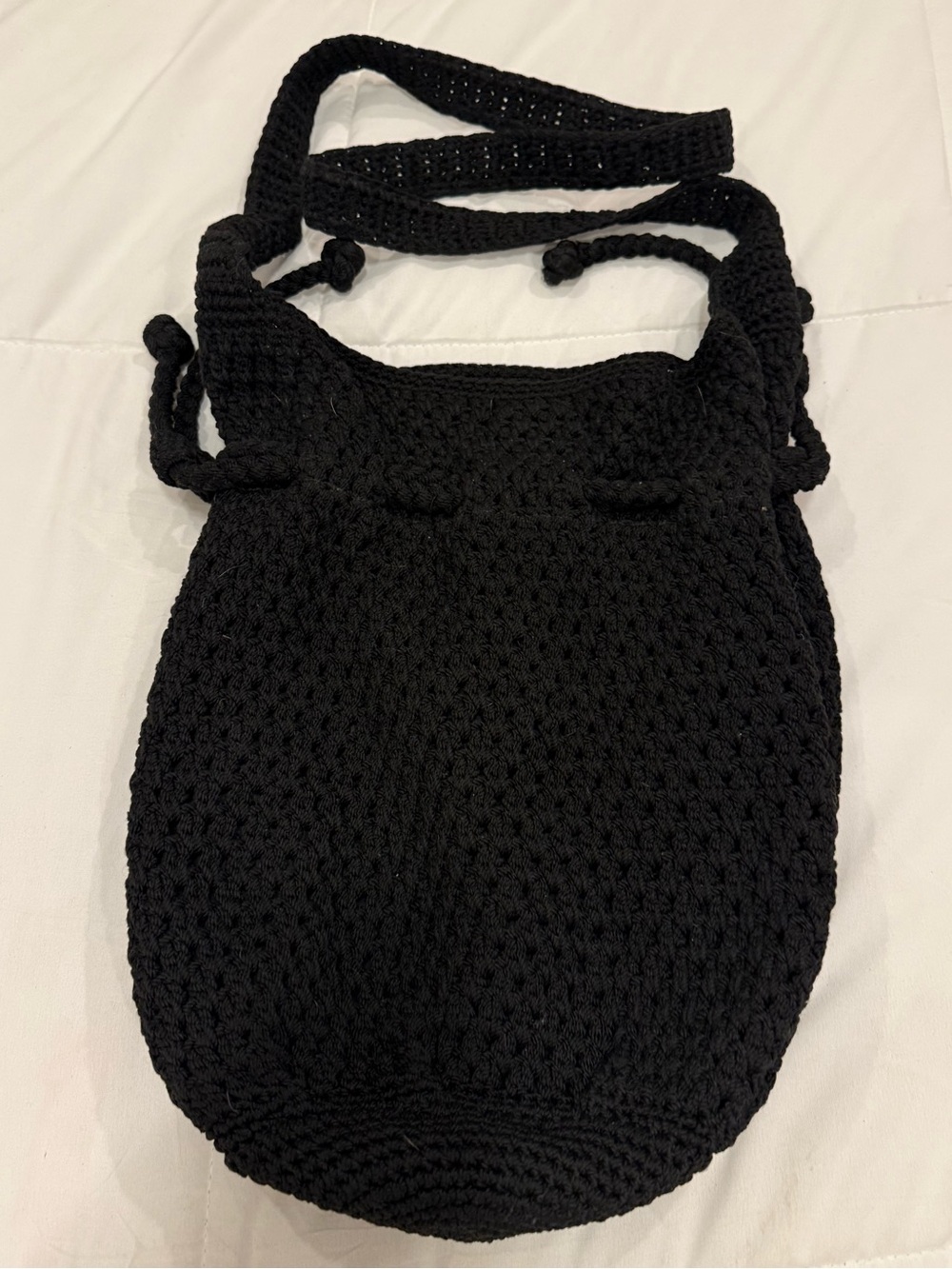 The Sak Black Crochet Drawstring Bucket Hobo Bag